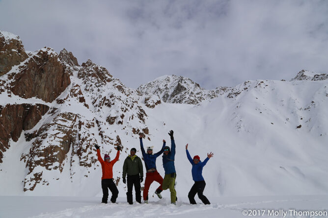 Group of fundraisers celebrating ascending a mountain
