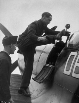 Fighter pilot Douglas Bader is photographed at North Weald Airfield getting into a spitfire ready to lead a flight over London commemorating the fifth anniversary of the Battle of Britain.
